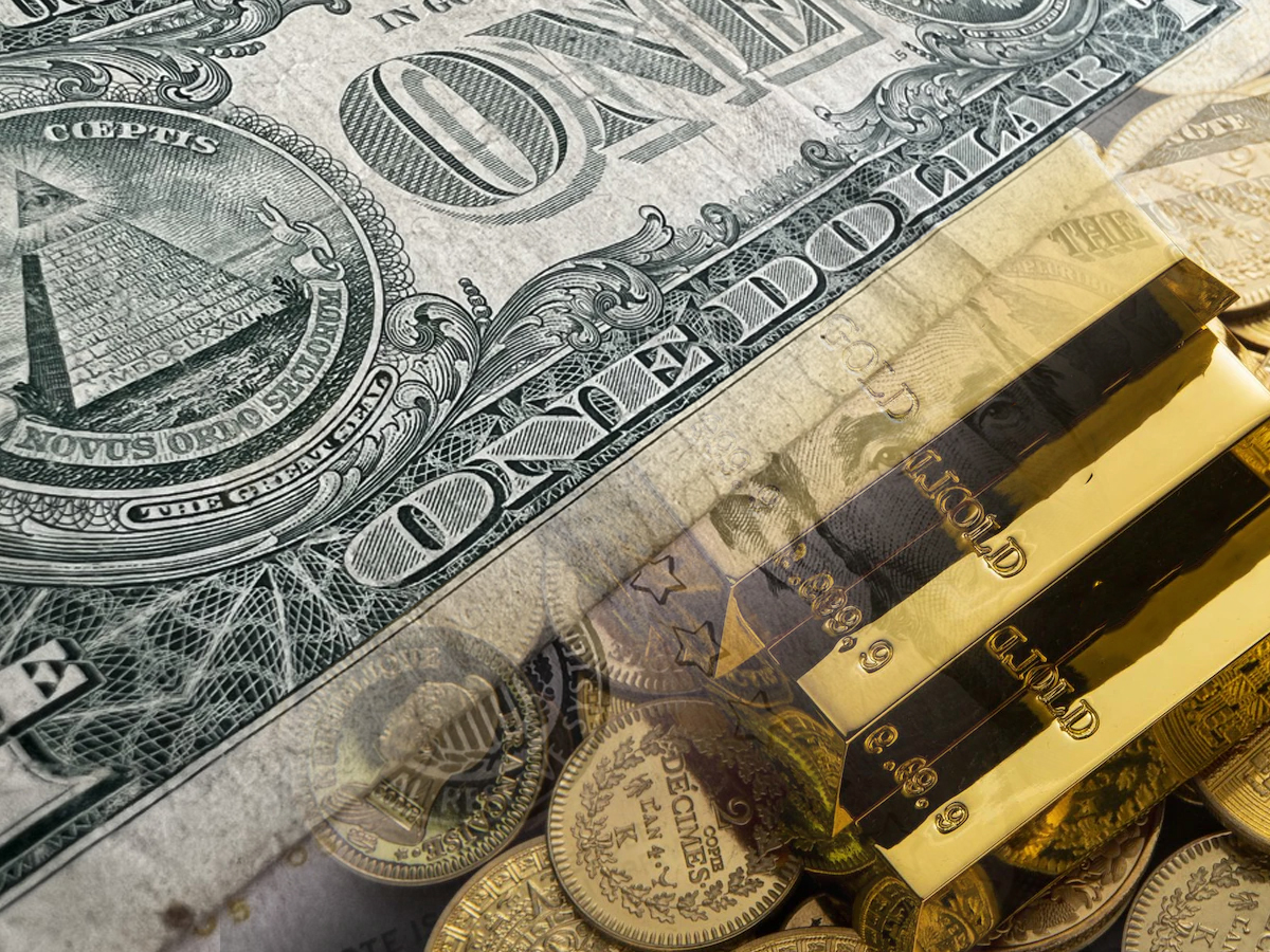 Эксперты объяснили причины роста стоимости золота против доллара